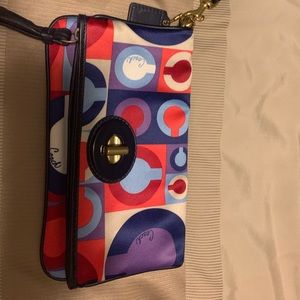 Coach satin wristlet. Never used. Like new.
